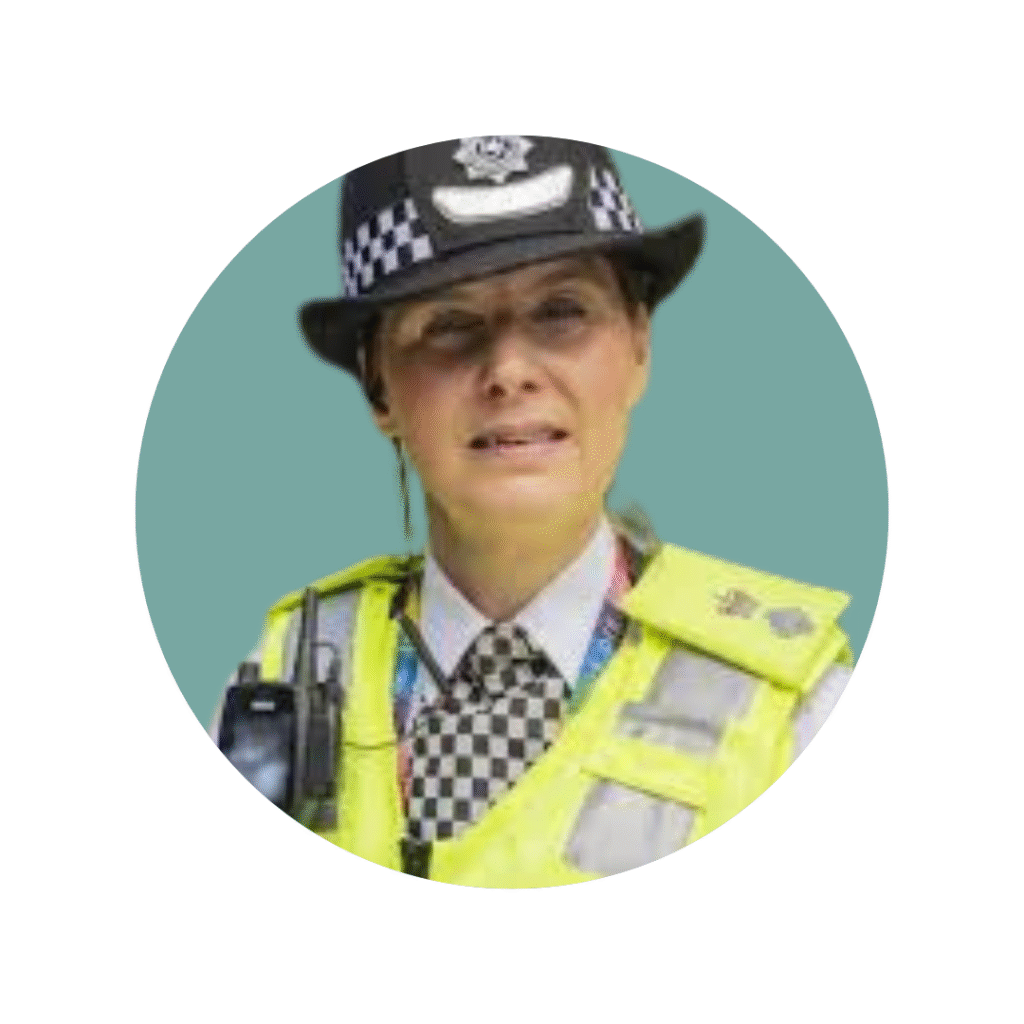 Image of a woman in police uniform looking towards the camera