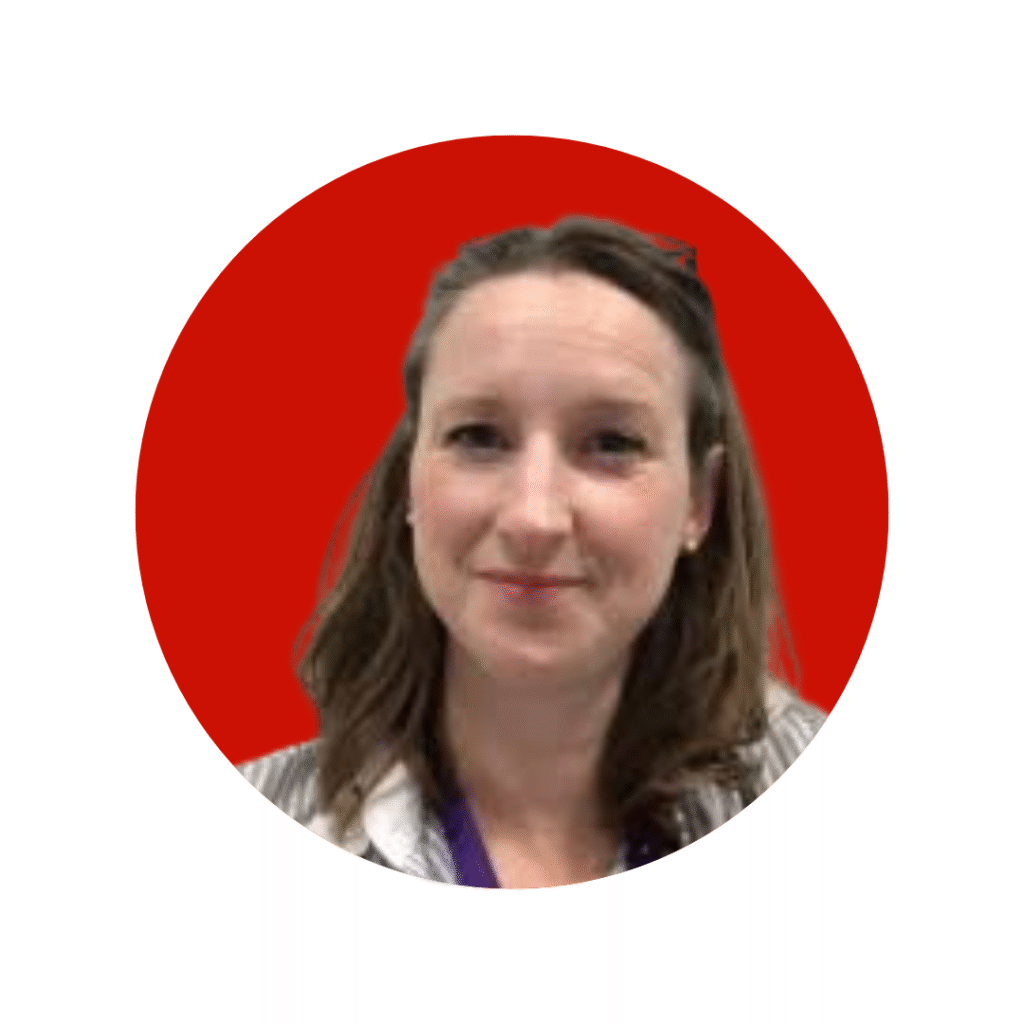 woman with mid length brown hair and light top smiling at camera